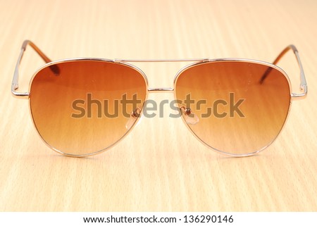light brown sun glasses