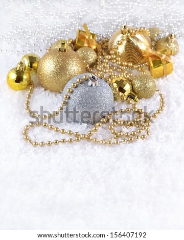 Golden and silver  Christmas decorations on a white background