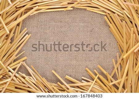 Frame of straw on burlap