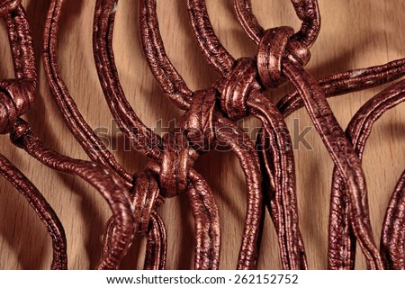 Knots on leather straps