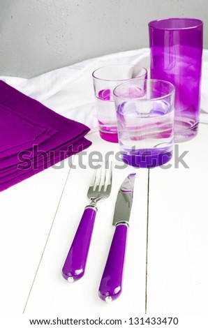 Catering Table Set In Purple Color With Silverware, Napkin And Glasses In Vintage Style. Shalow DOF.