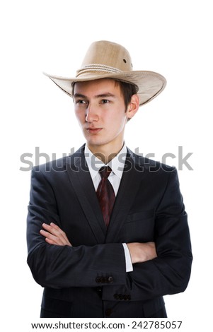 portrait of a young attractive male model in a cowboy hat