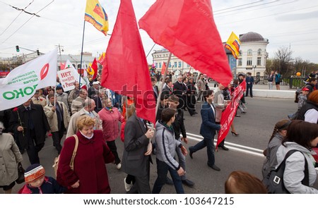 VLADIMIR, RUSSIA - MAY 1: Citizens are participating in the march of International Workers' Day event May 1, 2012 in Vladimir, Russia. Workers and opposition group walks in main street