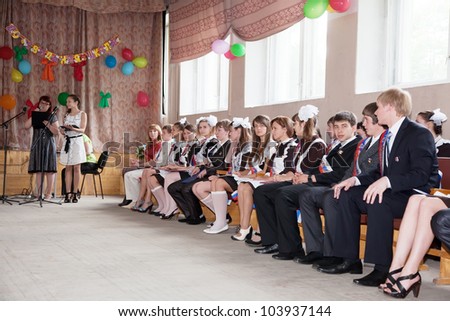VLADIMIR, RUSSIA - MAY 24: \'Last Bell\' event. May 24, 2012 in Vladimir, Russia. School leavers celebrate the \'Day of Farewell Bell\'  in school Ã?Â¹ 33.  School graduates say farewell to school life