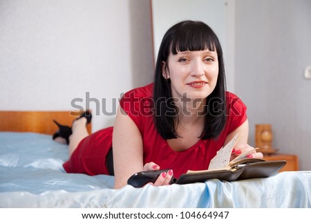 Woman speak by phone in home