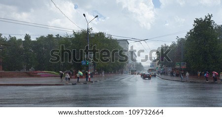 NIZHNY NOVGOROD, RUSSIA - JULY 19: Rain at city streets in July 19, 2012 in Nizhny Novgorod, Russia.  The sun shines an average of 1775 hours per year in this city