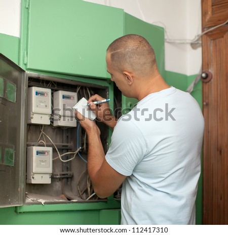 Man rewrites the electrical meter readings