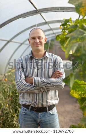 Portrait of  man in greenhouse
