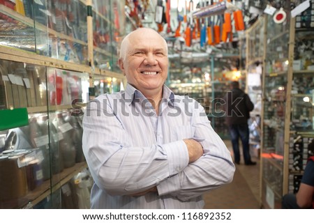 Mature manager  in  auto parts store