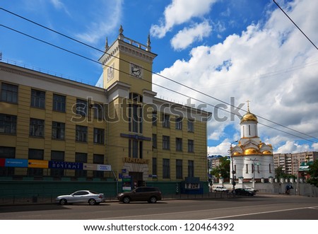 IVANOVO, RUSSIA - JUNE 27: View of Ivanovo. Trinity temple and Post Office on June 27, 2012 in Ivanovo, Russia. In 2000 construction began on temple of Holy Trinity. Now final stage of construction