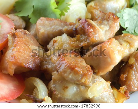 Stewed meat with a potato and tomatoes