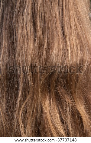 Textured of fine long haired young woman