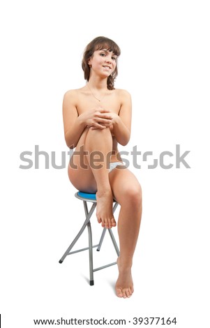 stock photo nude girl sitting on stool Isolated on white background