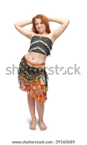red-haired girl in oriental costume dancing bellydance