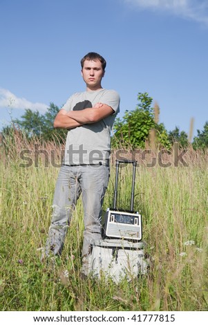 dj man with old radio receiver at nature