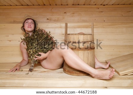 Young woman take a steam bath at sauna