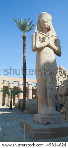 Pharaoh Ramses II statue in the Temple of Amun-Ra at Karnak. Antique Thebes. Luxor, Egypt.