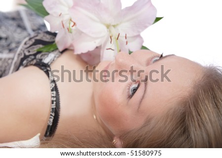 the young woman with  lily on white background