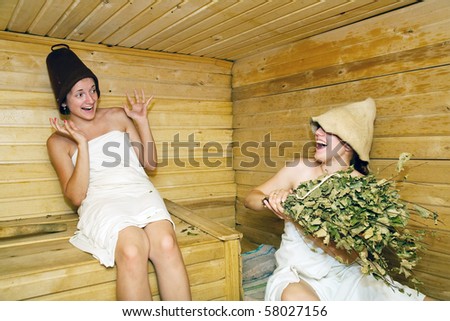 Young girls is taking steam-bath  at sauna