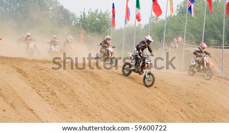 VLADIMIR, RUSSIA - AUGUST 7: Unidentified riders at XX International motocross for prizes of Tochmash factory, August, 7, 2010 in Vladimir, Russia.