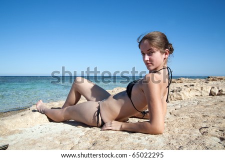 beauty girl enjoying the beach on nice day