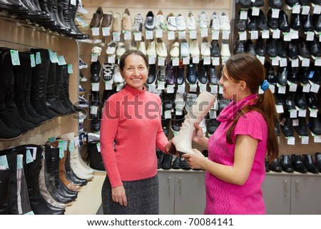 Two women shopping at fashion shoe shop