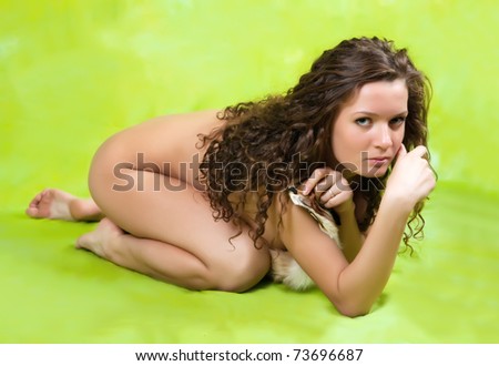 naked   long haired girl on green background