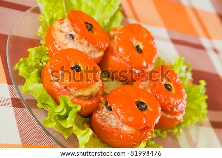 cooked baked stuffed tomato. See in series stages of cooking of farci tomato