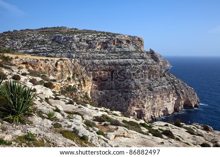 Cliffs of  Maltese islands over Mediterranean wave