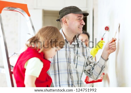 family making repairs at his home