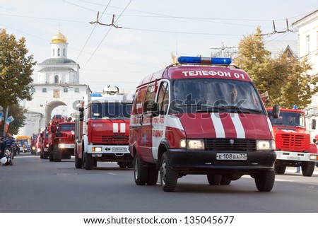 VLADIMIR, RUSSIA - SEPTEMBER 15: City Day  event September 15, 2012 in Vladimir, Russia.  Fire trucks in carnival procession  dedicated to the 1022 anniversary of Vladimir city