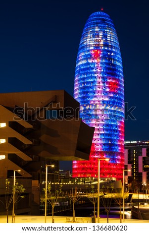 BARCELONA, SPAIN - APRIL 12: Torre agbar night in in April 12, 2013 in Barcelona, Spain. Skyscraper, built in 1999-2005 by Jean Nouvel. Now one of  symbols of Barcelona is owned by Grupo Agbar