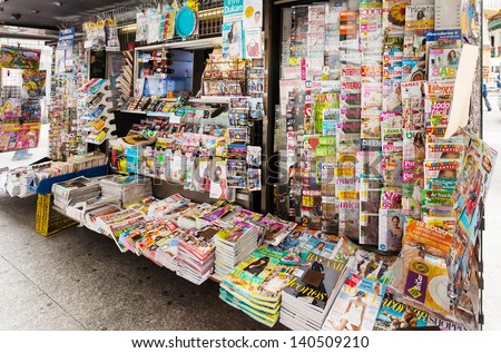 MADRID SPAIN APRIL 26 News stands in April 26 2013 in Madrid Spain Outdoor stands with newspapers and magazines at city street MADRID SPAIN APRIL 26 News stands in April 26 2013 in Madrid Spain Outdoor stands with newspapers and magazines at city street
