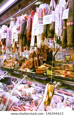 BARCELONA, SPAIN - MARCH 28: Meat at La Boqueria market in March 28, 2013 in Barcelona, Spain.  Market has been known since 1217. Now - one of the city\'s foremost tourist landmarks