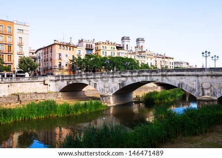 GIRONA, SPAIN - JULY 1: Bridge over the river Onyar in July 1, 2013 in Girona, Spain.  One of the oldest cities in Europe with a well-preserved medieval buildings.  Population: 96,722  (2011 Census)