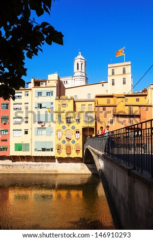 GIRONA, SPAIN - JULY 1: Bridge over river Onyar in July 1, 2013 in Girona, Spain.  One of the oldest cities in Europe with a well-preserved medieval buildings.  Population: 96,722 (2011 Census)