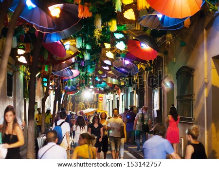 Barcelona, Spain - August 15: Gracia Street Festival At Night On August 15, 2013 In Barcelona, Spain. Decorated Streets Of Gracia District. Umbrella Theme