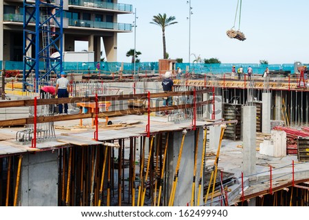 BADALONA, SPAIN - JUNE 13: View of  of building new concrete house in June 13, 2013 in Badalona, Spain.  City was founded by the Romans in the 3rd century BC.  Population: 220,977 (2012 Census)