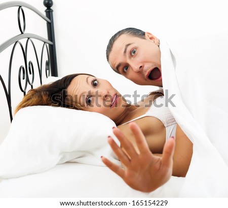Frightened man caught during  sex with girlfriend in bed