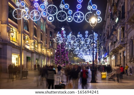 Barcelona, Spain - December 2: Night View Of Barcelona On December 2, 2013 In Barcelona, Spain. Christmas Decorations On Portal Del Angel