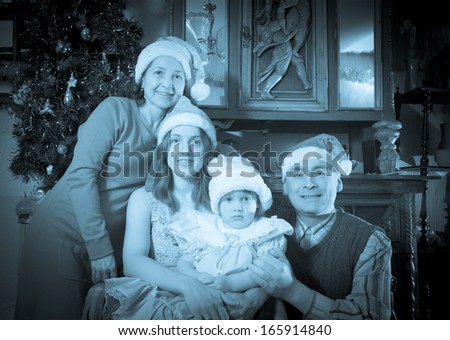 Imitation of  Vintage photo of happy  family  in Christmas time or the holiday season