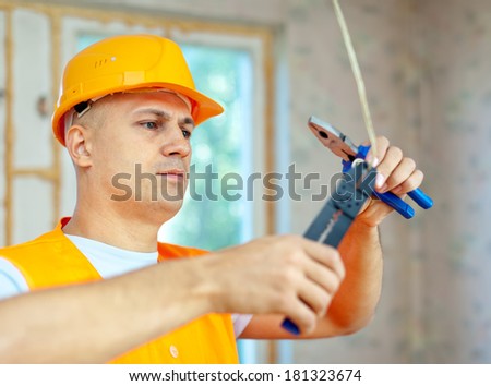 electrician installing electricity in a new house