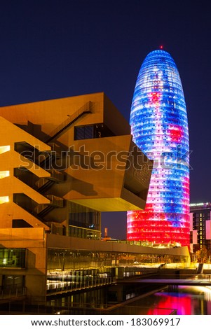BARCELONA, SPAIN - APRIL 12, 2013: Night view of Torre agbar in Barcelona, Spain. 38 storey skyscraper, built in 2005 by Nouvel. Now one of the symbols of Barcelona is owned by Grupo Agbar