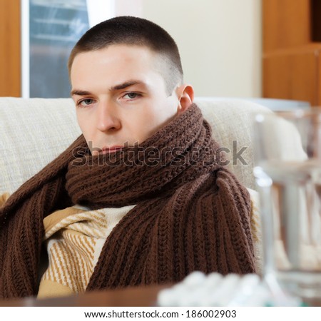 ordinary illness man in warm scarf