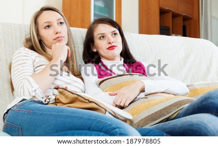 sadness girlfriends together   in home