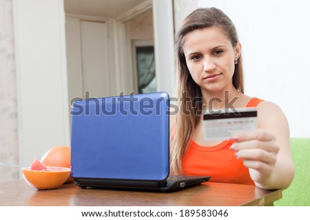 beauty woman shopping online in living room at home