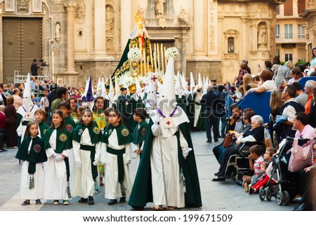 MURCIA, SPAIN - APRIL 15, 2014: Holy Week in Spain. Holy Week is  annual commemoration  by Catholic religious brotherhoods, processions on the streets of almost every Spanish city