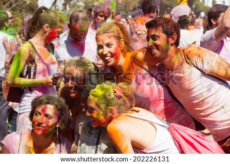 BARCELONA, SPAIN - APRIL 6, 2014: People in paint pigments at IV Festival of colors Holi Barcelona