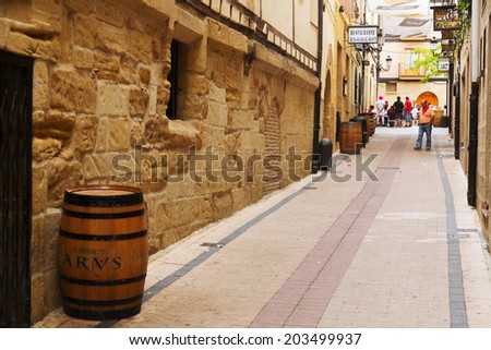 HARO, SPAIN - JUNE 29, 2014: Narrow street with  restaurant at old spanish town in Haro. La Rioja, Spain