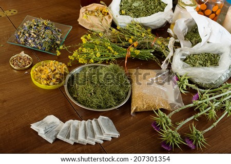 dried herbs at table in home ready for brews